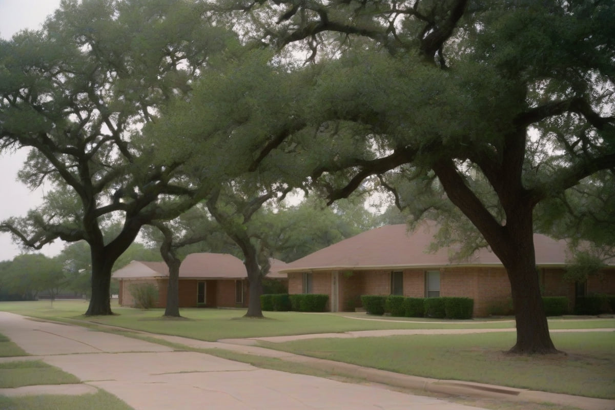 Mixed one and two story brick homes with varied rooflines on gently rolling terrain in Grand Prairie, Texas